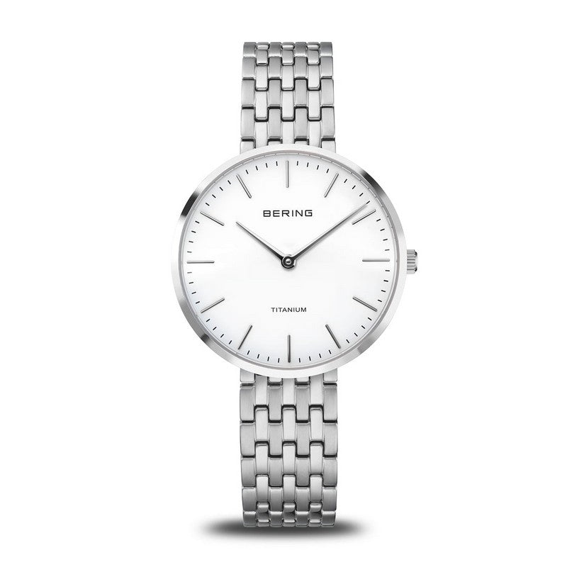 BERING Titanium dameur i stål med hvid urskive og minimalistisk nordisk design
