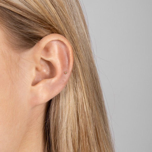 Nordahl Andersen piercing i 14 kt. guld med kugle – set fra siden