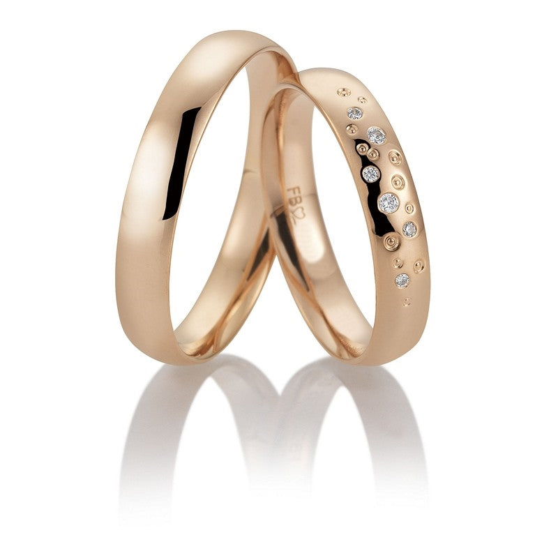 Breuning vielsesringe i 14 kt rosa guld med blank overflade og 0,042 ct brillanter