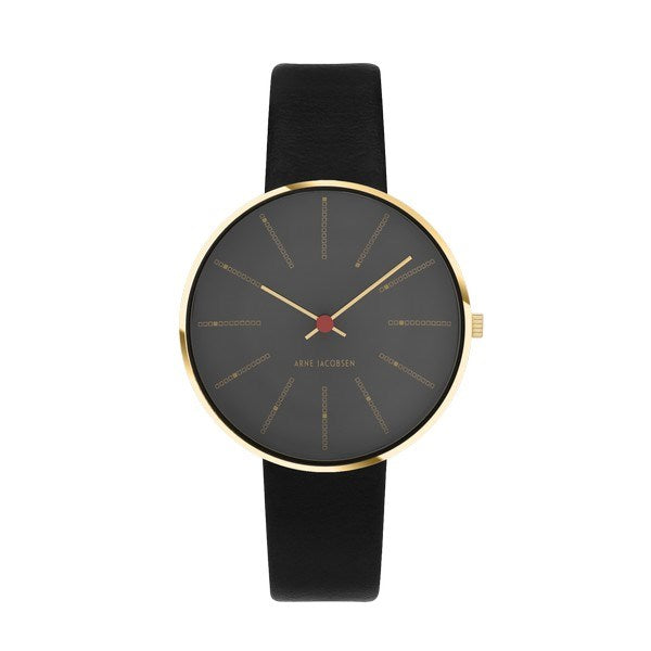 Arne Jacobsen Bankers 50års jubilæumsur med grå marmorinspireret skive, guldpoleret stål og sort læderrem, Ø34mm