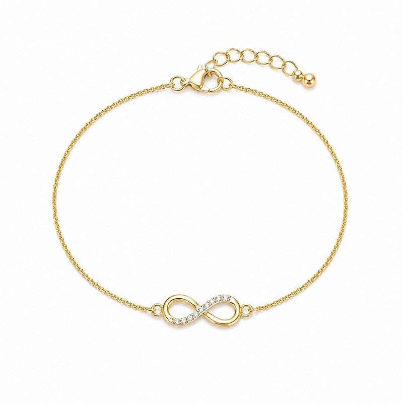 Armbånd i 8 karat guld med evighedstegn og zirkoniasten