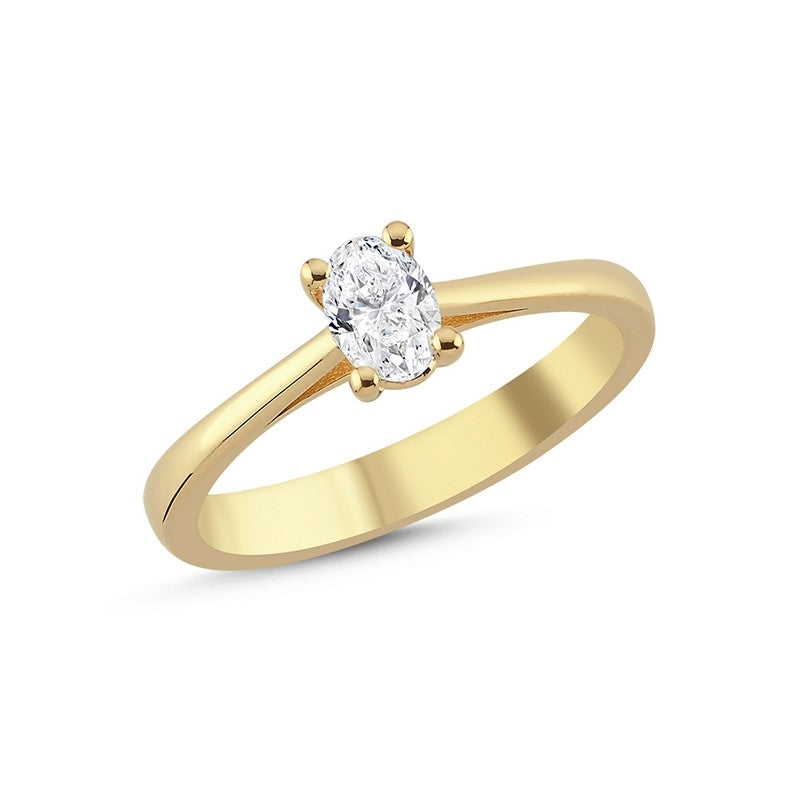 Nuran The One Oval diamantring i 14 karat guld, liggende på flade