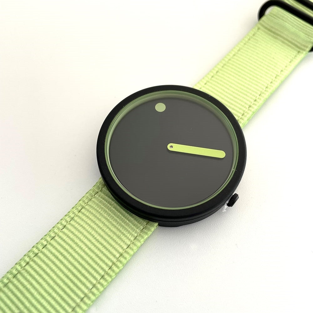 Picto unisex ur med Manta Ray Black urskive og Paradise green rem – liggende på flade