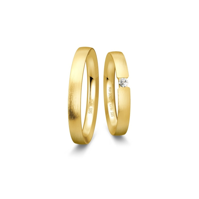 Breuning vielsesringe i 8-14 kt guld med mat overflade og 0,05 ct brillant i dameringen.