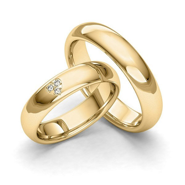 Siersbøl vielsesringe i guld med tre brillanter i hjerteform – romantisk og klassisk design