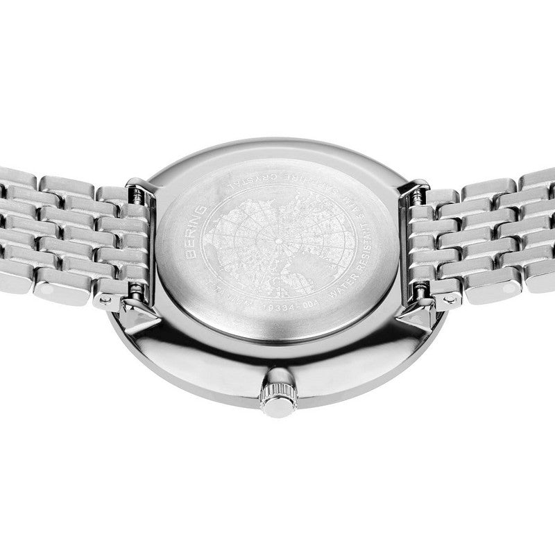BERING Titanium dameur i stål med hvid urskive, set fra siden