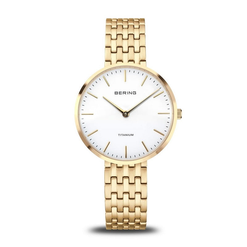 BERING Titanium dameur til damer i gulddublé med hvid urskive og 34 mm kasse