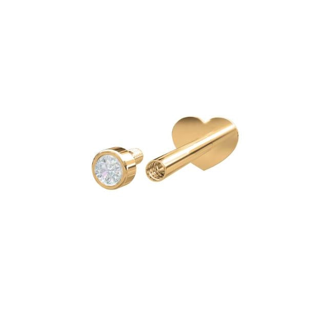 Nordahl Andersen labret piercing i 14 karat guld med diamant – set fra siden