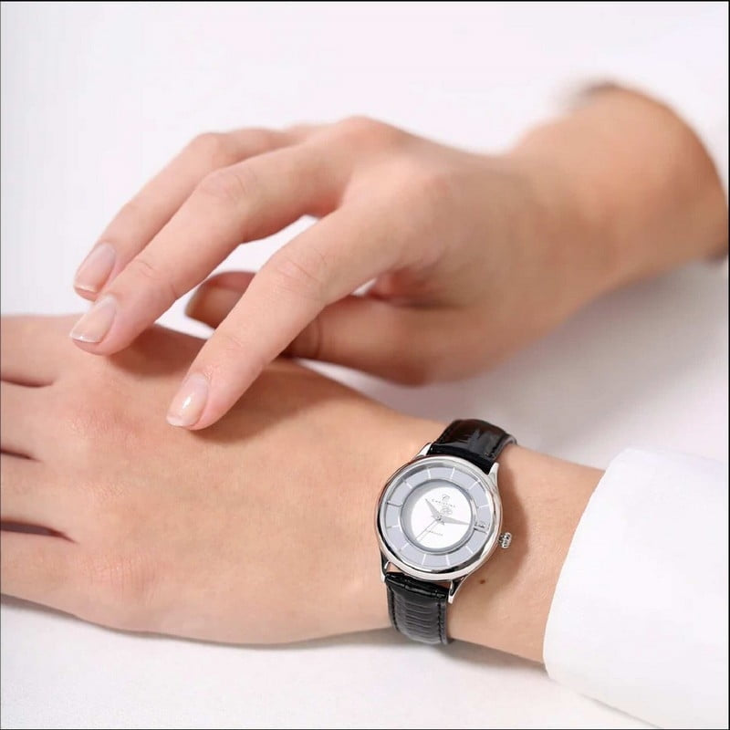 Christina Jewelry & Watches dameur i stål med hvid skive og diamant, set fra siden