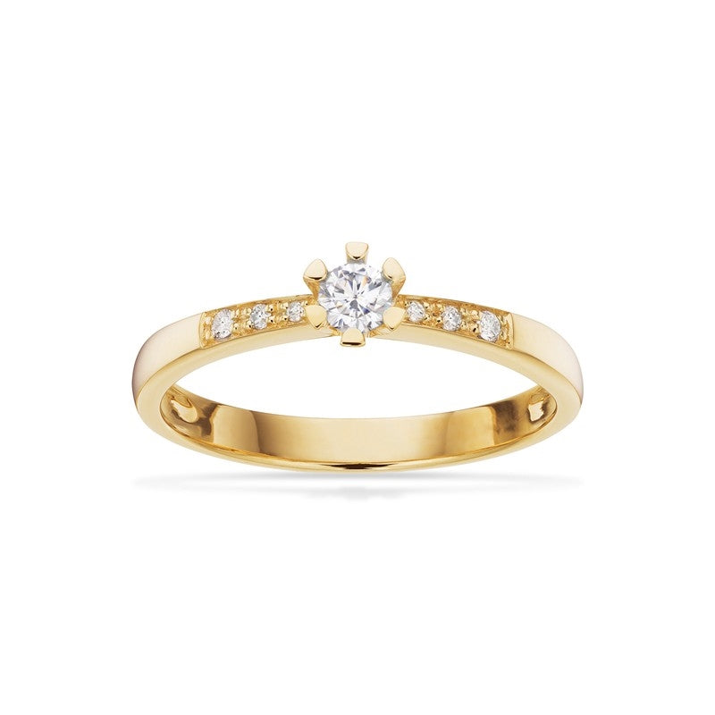 Scrouples Vida Darling ring i 14 karat guld med centerbrillant flankeret af mindre diamanter