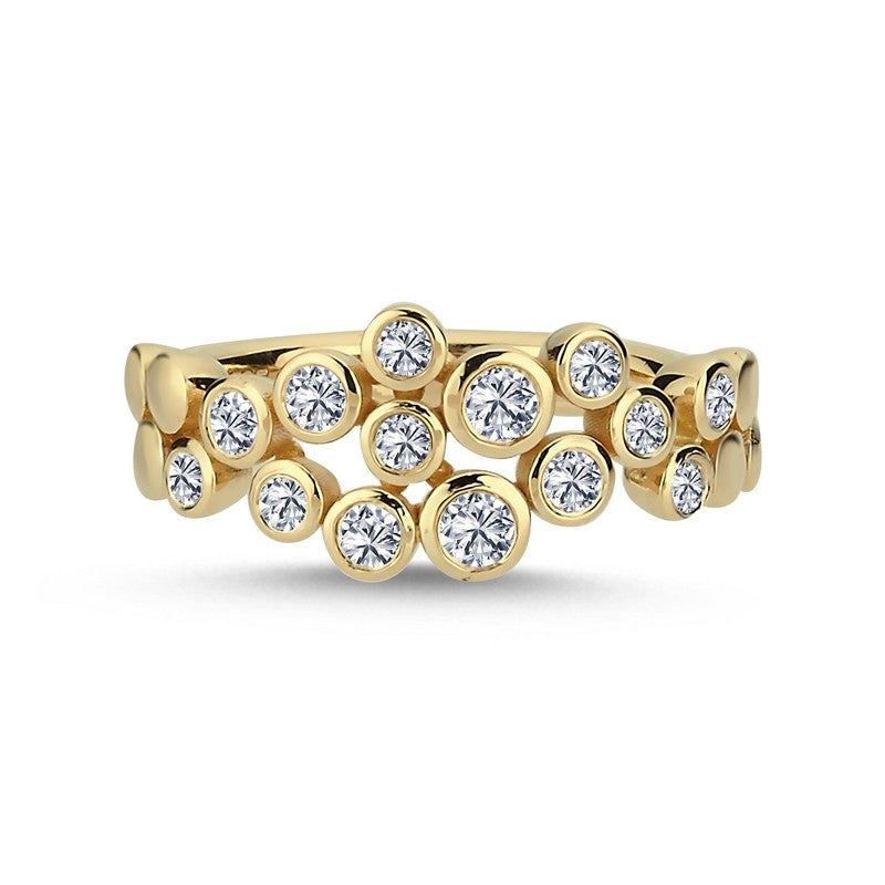 Nuran Bubbles ring i 14 kt guld med 0,38 ct diamanter i tube fatninger – liggende på flade