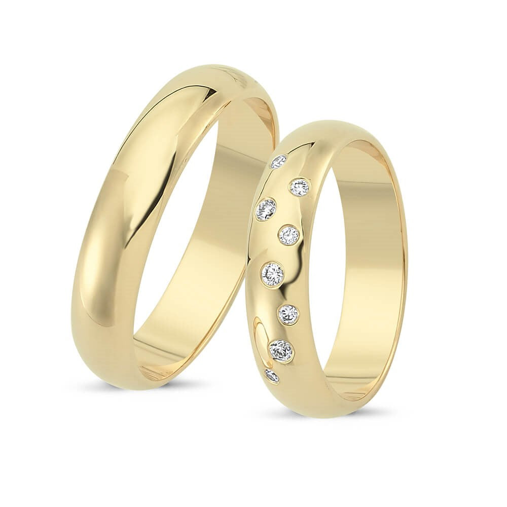 Nuran vielsesringe i 14 karat guld med 8 brillanter i alt 0,11 ct diamanter