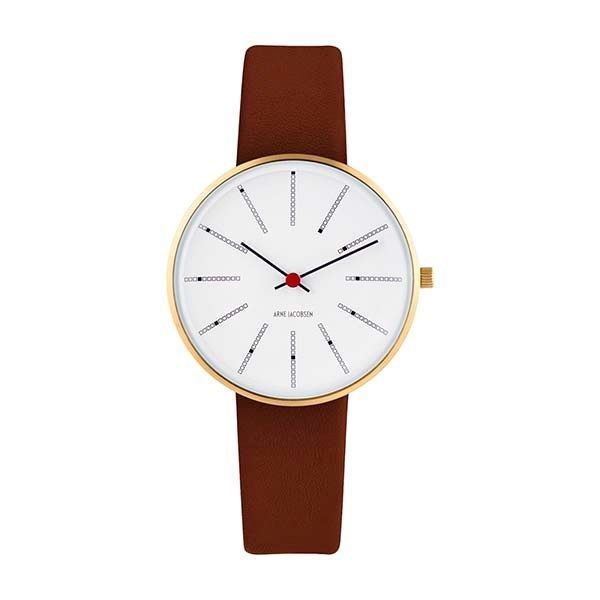 Arne Jacobsen Bankers armbåndsur med hvid skive, IPG-forgyldt topring og brun læderrem i Ø34 mm