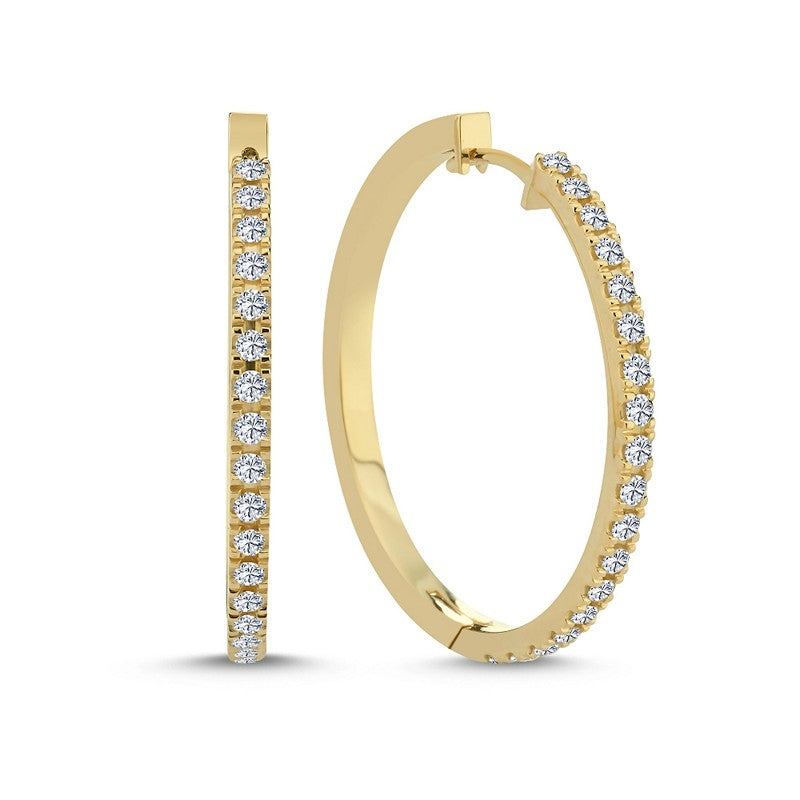 Nuran creoler i 14 karat guld med 0,68 ct hvide diamanter og diameter på 30 mm