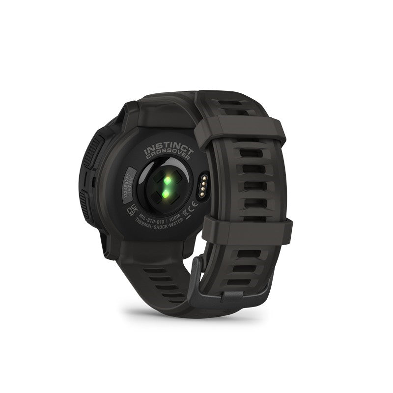 Garmin Instinct Crossover Solar Graphite herreur i rustfrit stål, liggende på flade