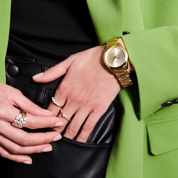 Sif Jakobs Jewellery JOELLE dameur i forgyldt stål med guld metallisk urskive – nærbillede af sten