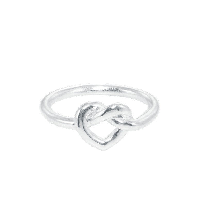 Jane Kønig Tied Heart Ring i sterlingsølv med flettet hjerte – dansk design